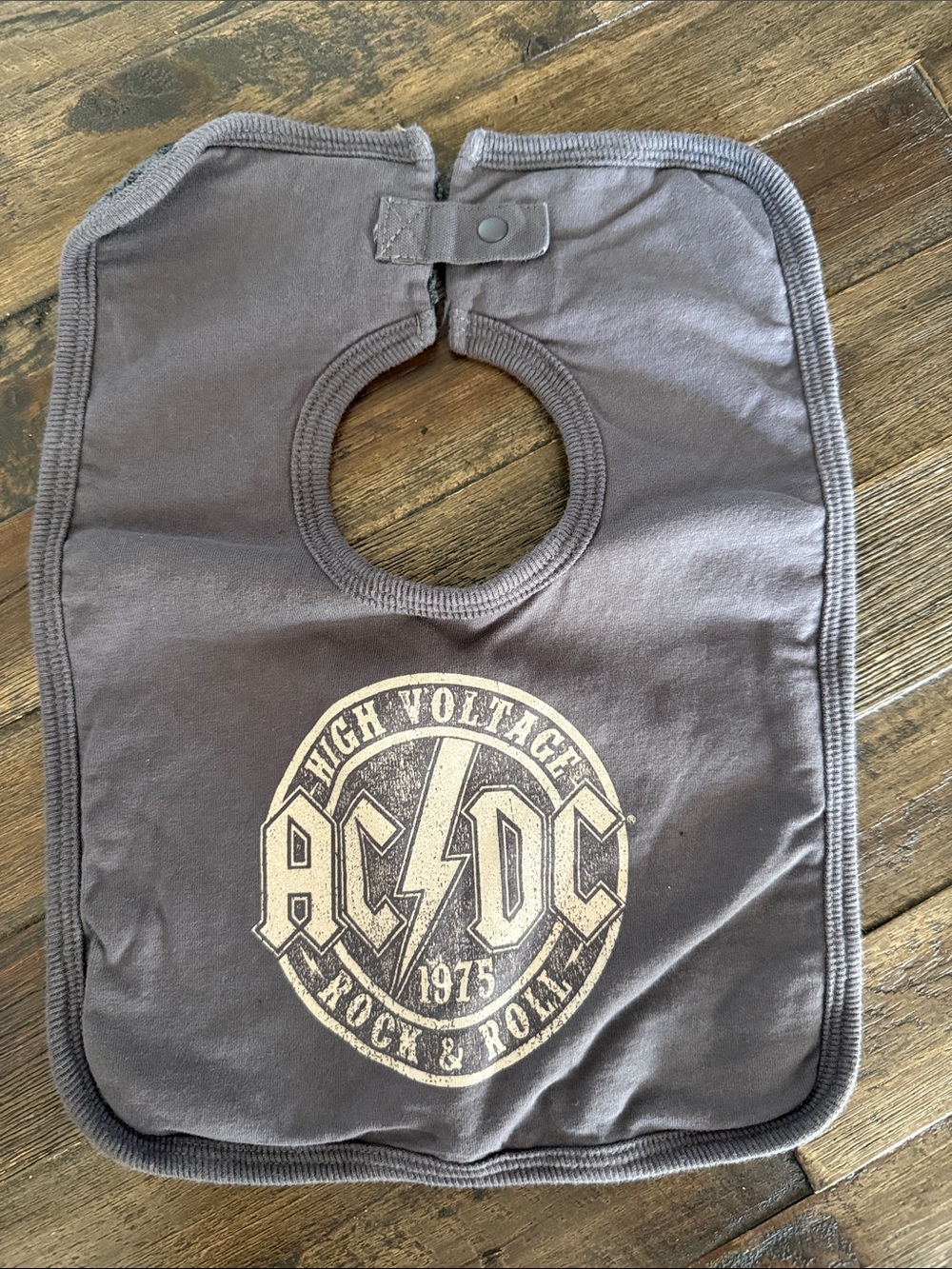 AC/DC Baby Bib in Gray with Cream Logo